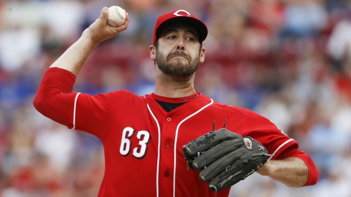 Dylan Floro throws in the ninth inning of a baseball game against the Chicago Cubs on June 23.