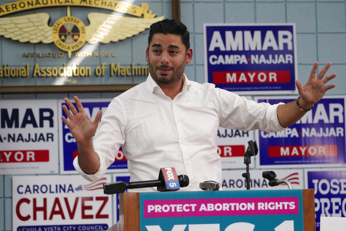 Ammar Campa-Najjar, candidate for Chula Vista Mayor spoke with his staff and volunteers in the late evening .