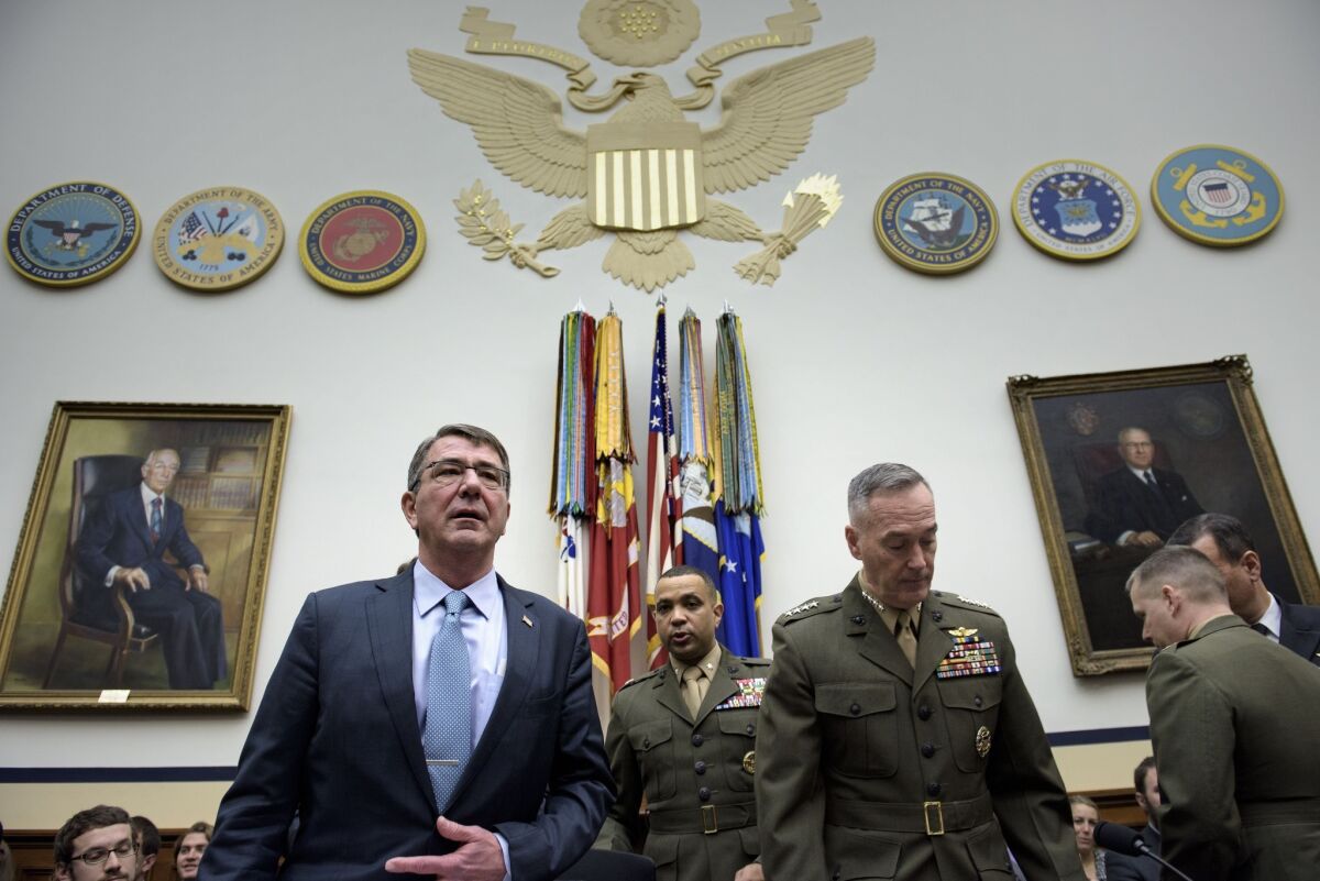 Defense Secretary Ashton Carter and Chairman of the Joint Chiefs of Staff Gen. Joseph Dunford arrive for a hearing of the House Armed Services Committee on Dec. 1.