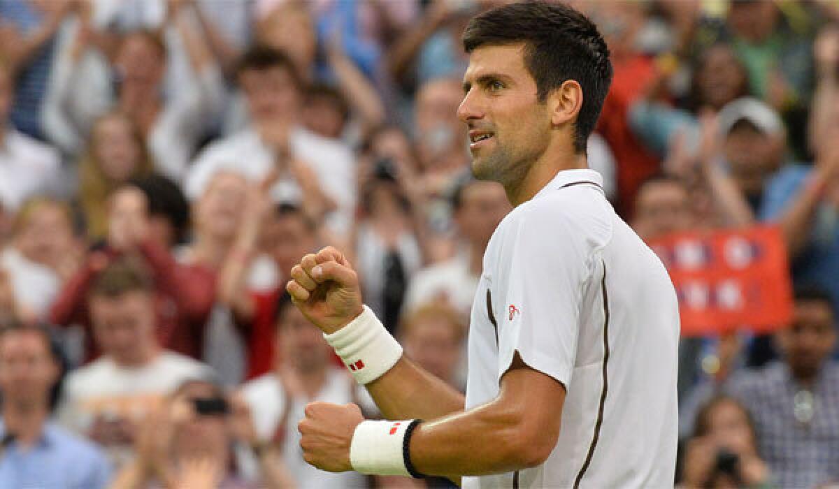 Novak Djokovic pumps his fist after eliminating Bobby Reynolds, the last American man in the tournament, in the second round at Wimbledon.
