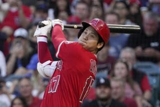 Los Angeles Angels' Shohei Ohtani hits a foul ball during the second inning.