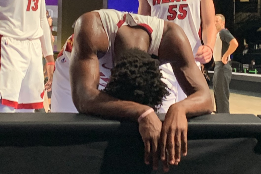 Heat star Jimmy Butler gathers himself after an exhaustin Game 5 effort on Friday night.