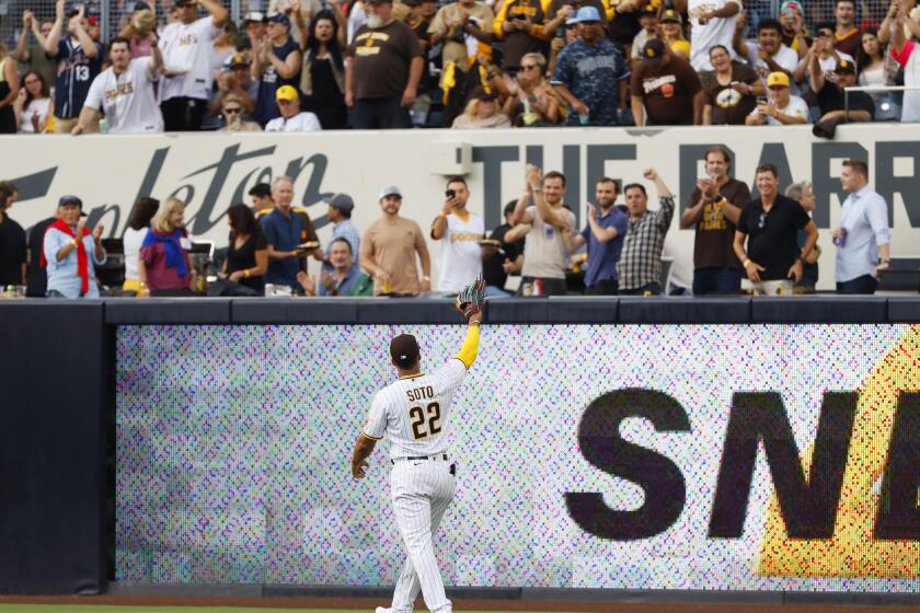 SAN DIEGO, CA - AUGUST 3: San Diego Padres right fielder Juan Soto waves to the crowd at the start of a game against the Colorado Rockies at Petco Park on Tuesday, August 3, 2022 in San Diego, CA. (K.C. Alfred / The San Diego Union-Tribune)