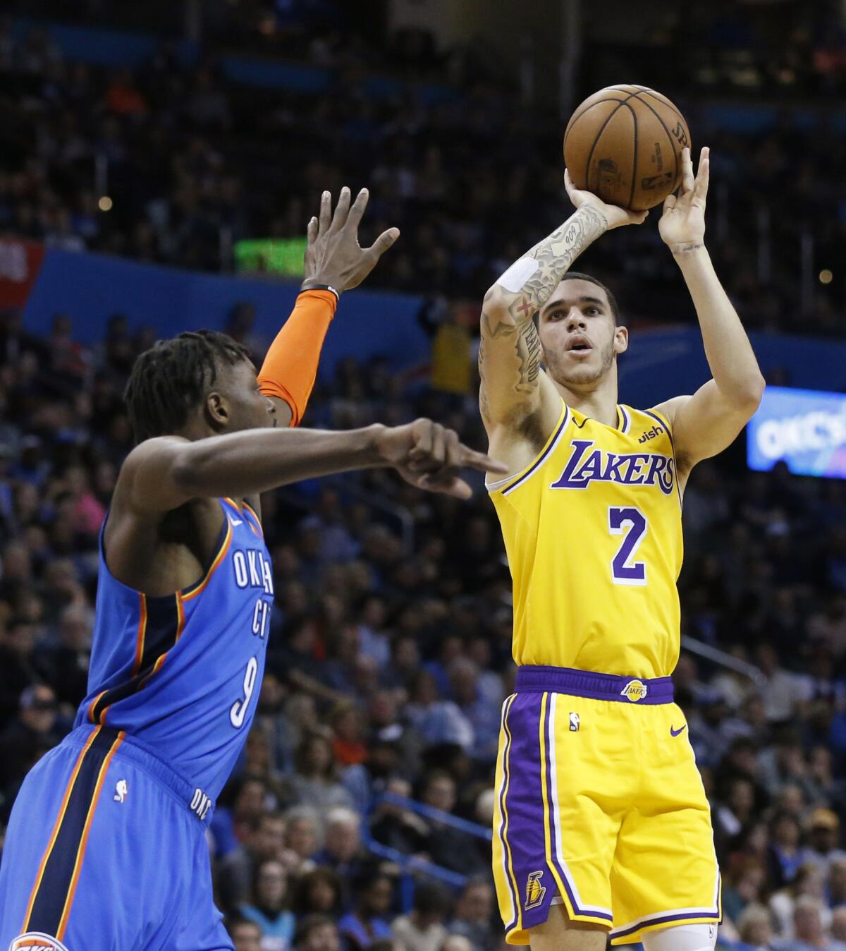 Lonzo Ball puts up a shot against Jerami Grant of the Thunder on Thursday.