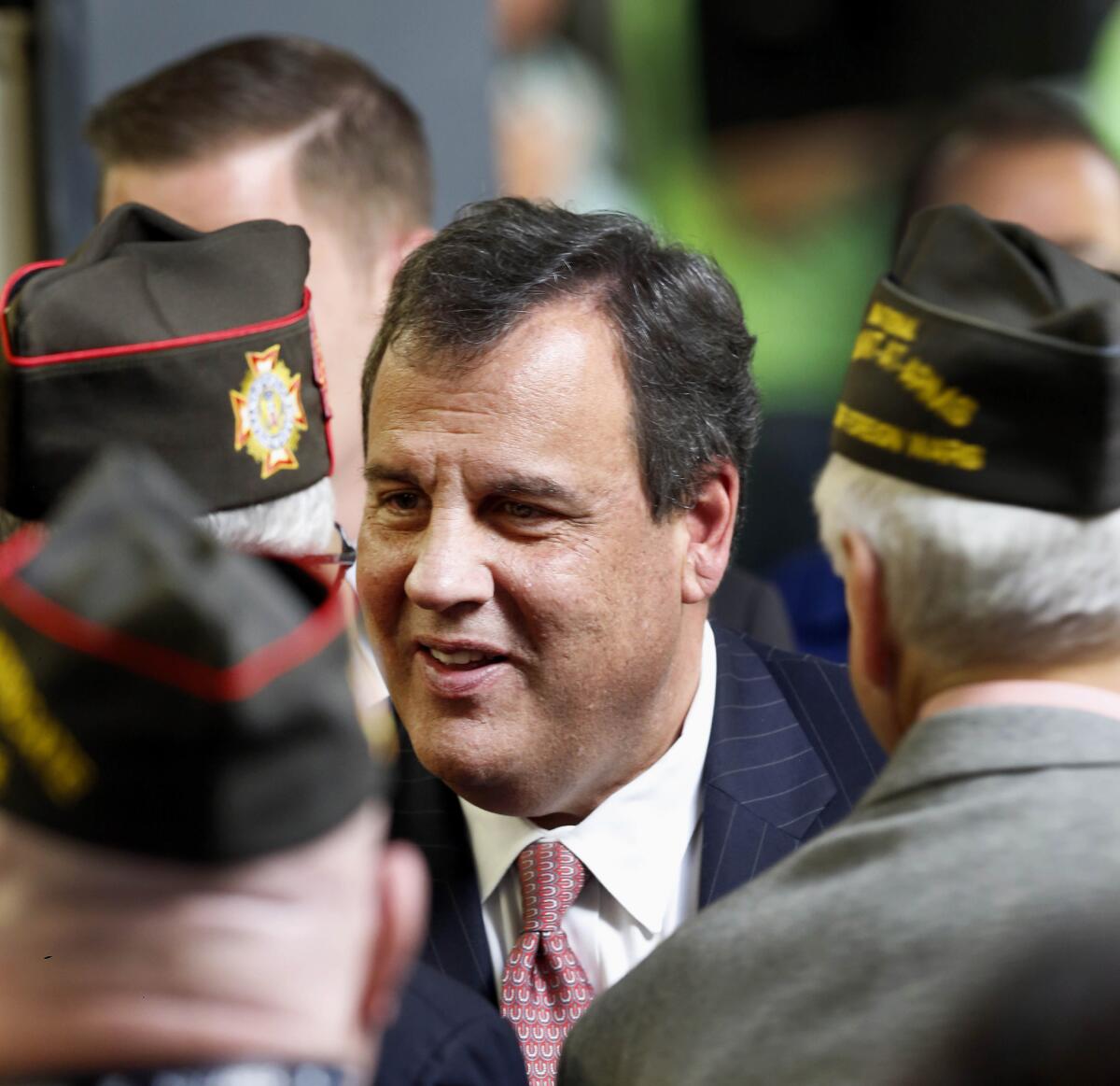 Republican presidential candidate, New Jersey Gov. Chris Christie greets voters after speaking at a No Labels Problem Solver convention, Monday, Oct. 12, 2015, in Manchester, N..H (AP Photo/Jim Cole)