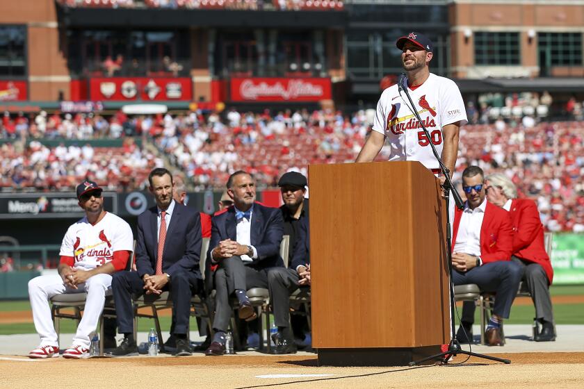 St. Louis Cardinals' Adam Wainwright speaks as he his honored during his retirement ceremony before the start of the Cardinals' final regular season baseball game, Sunday, Oct. 1, 2023, against the Cincinnati Reds in St. Louis. (AP Photo/Scott Kane)