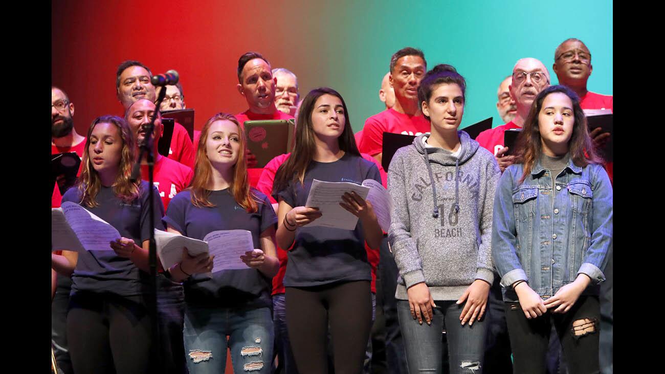 The Crescenta Valley High School Charismatics Chamber Choir, including senior Madison Haas, center, performed with the Gay Men's Choir of Los Angeles, during performance in the school's theater as part of Ally Week, in La Crescenta on Friday, Nov. 3, 2017.