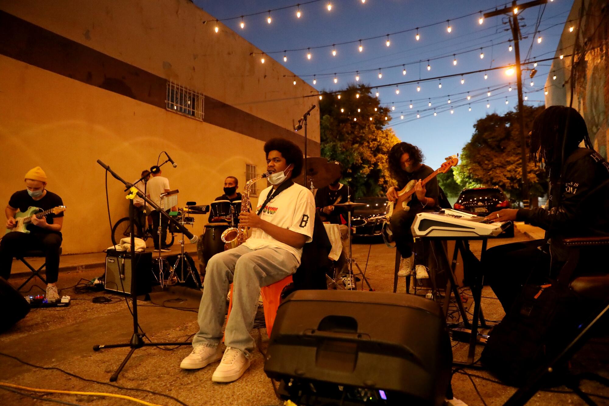 Chris Powe, center, performs with a jazz collective in Leimert Park.