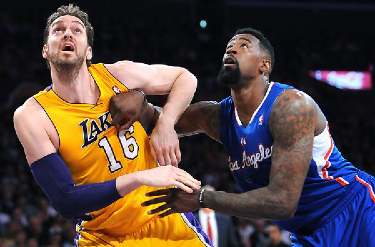 Lakers power forward Pau Gasol battles for position with Clippers center DeAndre Jordan during a game last month.