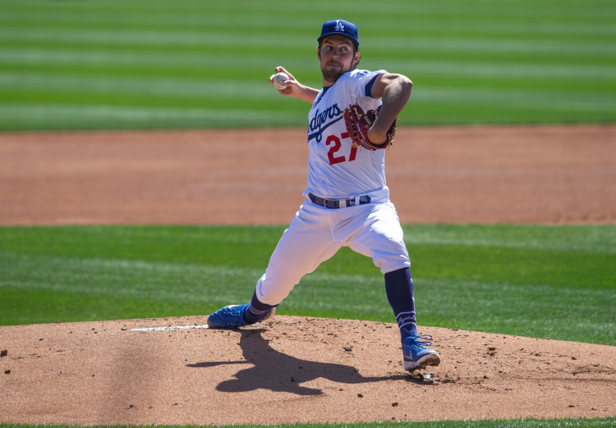 Dodgers pitcher Trevor Bauer delivers against the Colorado Rockies during a spring training game.