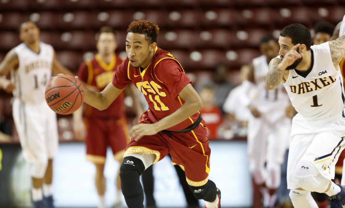 USC's Jordan McLaughlin, left, tries to get past Drexel's Freddie Wilson on Nov. 21.