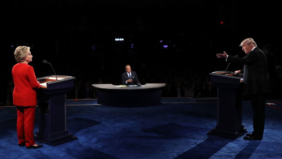 Lester Holt moderates the first of three debates between presidential candidates Donald Trump and Hillary Clinton in 2016.