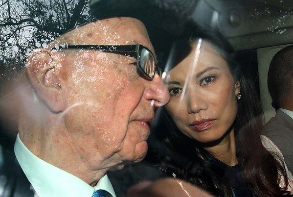 Rupert Murdoch and Wendi Deng leave London's High Court after Murdoch spoke to an official inquiry in the wake of the British media's phone-hacking scandal.
