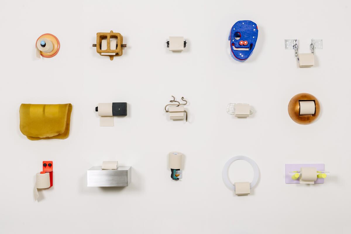 Artists designed toilet paper holders. 