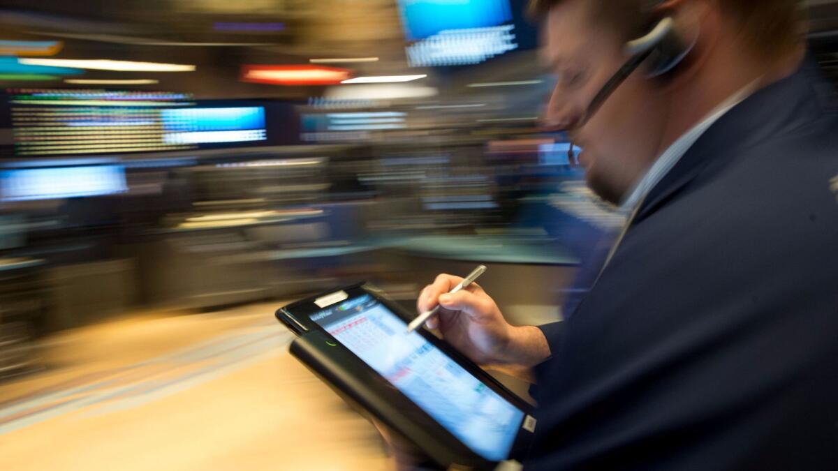 A New York Stock Exchange trader (Bryan R. Smith / AFP/Getty Images)