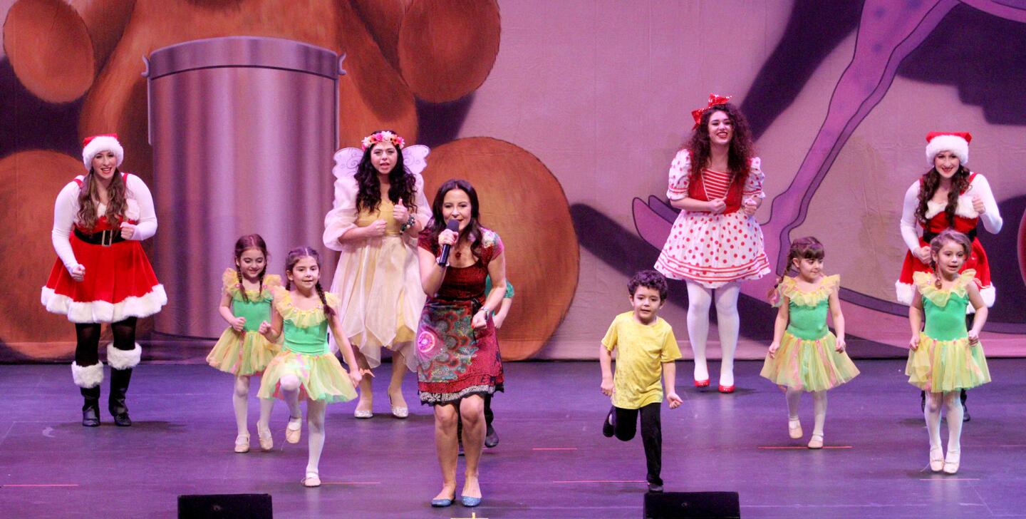 Taline, center and friends performed for a large crowd at the Alex Theater in Glendale on Tuesday, December 29, 2015. The show teaches children how to sing Armenian-language songs.