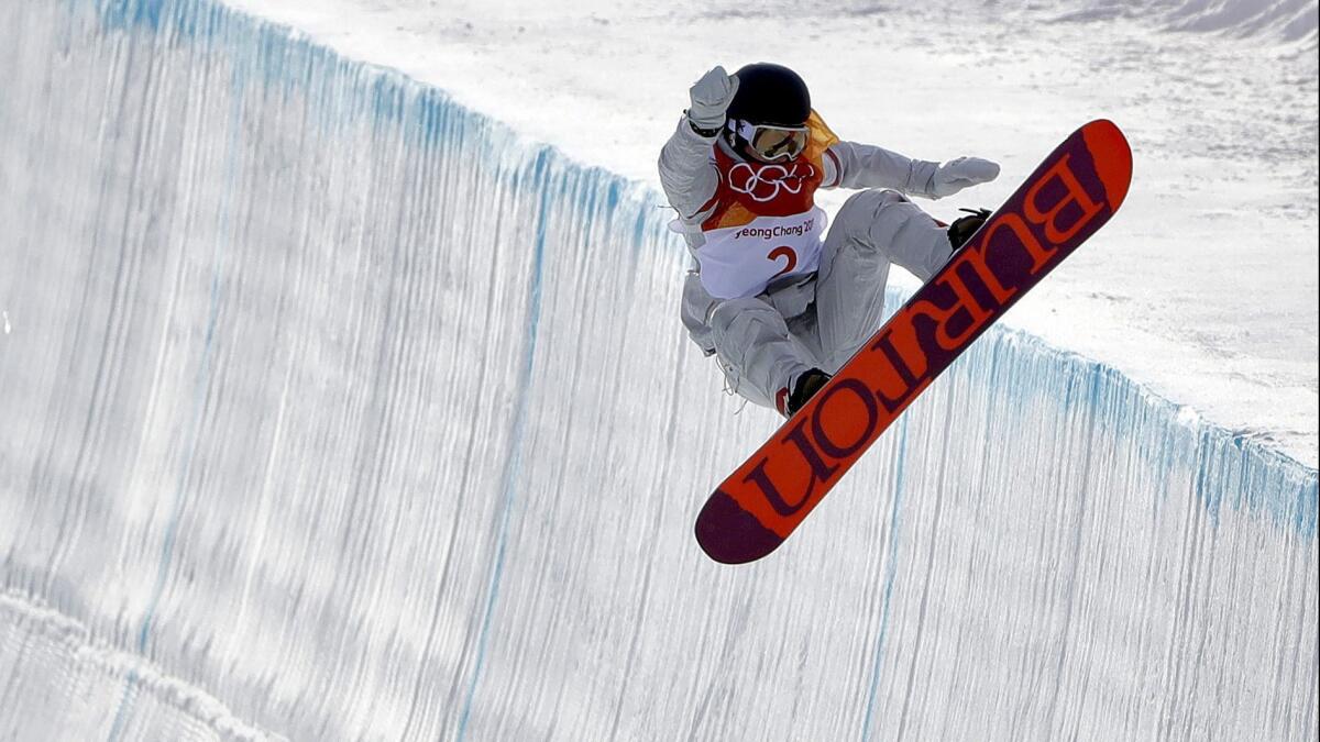 Kelly Clark competes in the women's halfpipe qualifying at the 2018 Winter Olympics in Pyeongchang, South Korea.