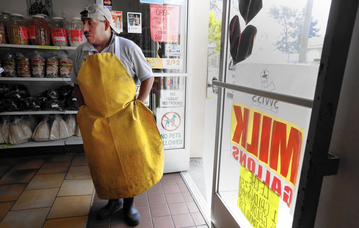 Miguel Sanchez, 43, works at Tortilleria San Marcos in Boyle Heights. He said an increase in the state's minimum wage to $15 an hour would give him some breathing room, but he doesn’t plan to quit his second job.