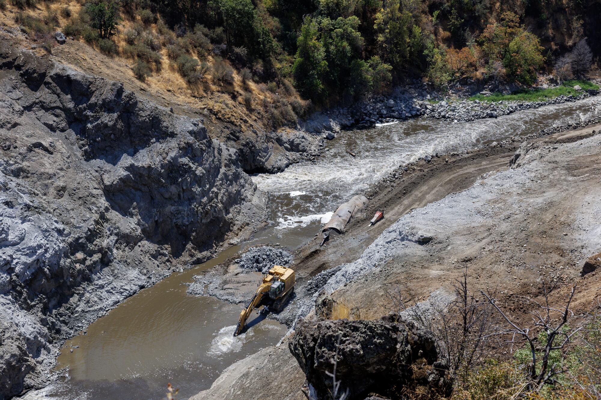 Machinery removes remnants of Copco No.1 dam along the Klamath River on Aug. 14. 