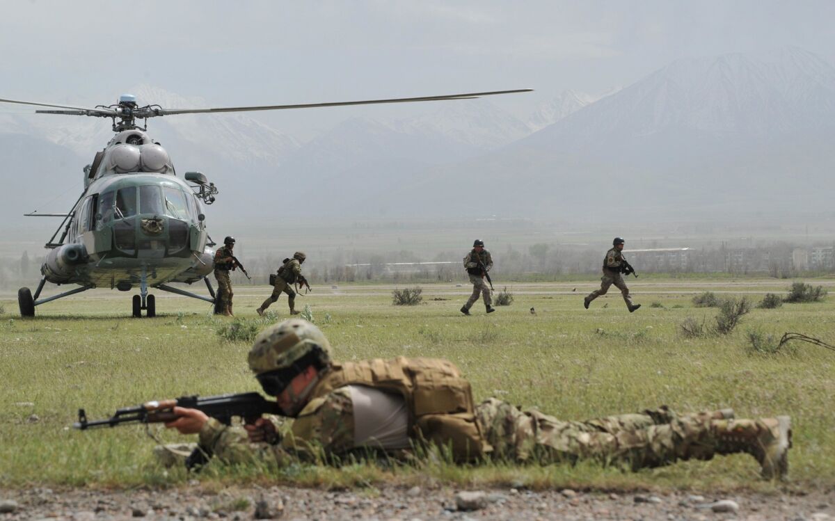 Special forces soldiers of the Shanghai Cooperation Organization, which includes Russia, deploy during military exercises last month in Kyrgyzstan.