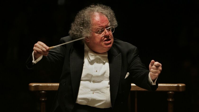James Levine conducts the Boston Symphony Orchestra in Boston in 2005. The conductor has been accused of sexually abusing young men decades ago — allegations he denies.
