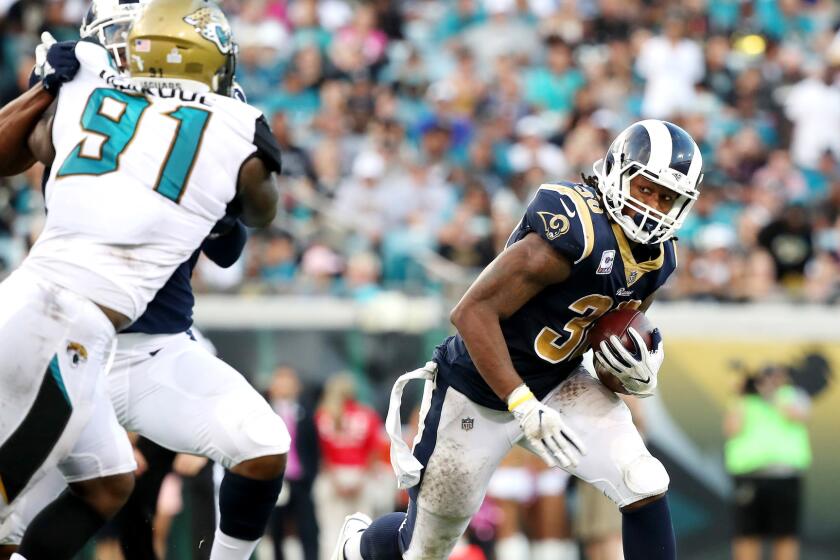 JACKSONVILLE, FL - OCTOBER 15: Todd Gurley #30 of the Los Angeles Rams runs with the football in the second half of their game against the Jacksonville Jaguars at EverBank Field on October 15, 2017 in Jacksonville, Florida. (Photo by Logan Bowles/Getty Images) ** OUTS - ELSENT, FPG, CM - OUTS * NM, PH, VA if sourced by CT, LA or MoD **