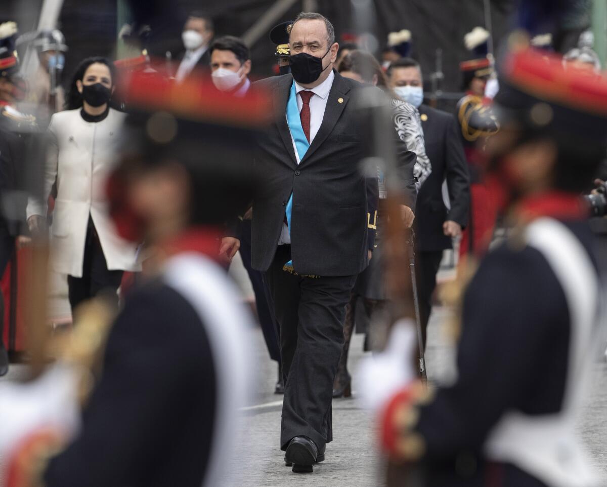 Guatemalan President Alejandro Giammattei wearing a protective face mask.