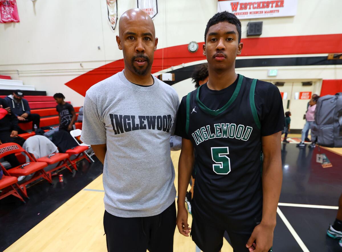 Jason Crowe Jr., right, and his father.