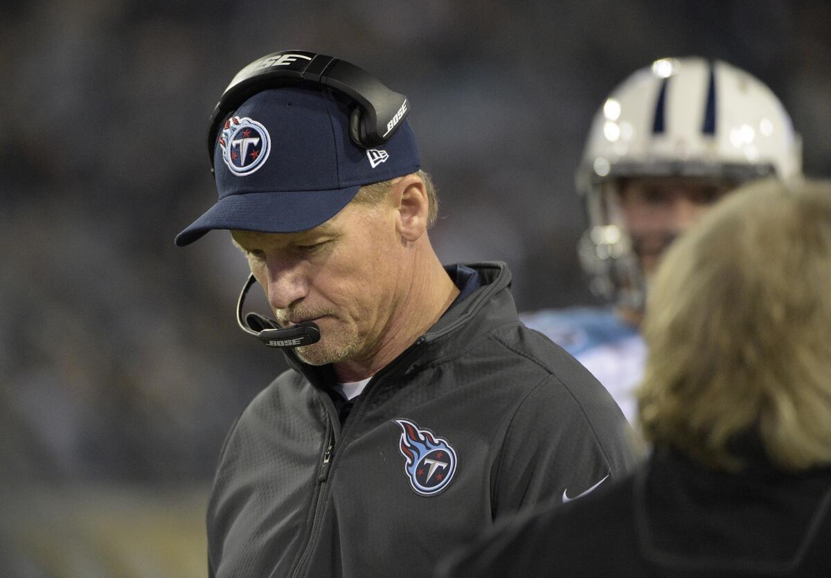 Tennessee Titans Coach Ken Whisenhunt looks down during the third quarter of a game against the Jacksonville Jaguars on Dec. 18.