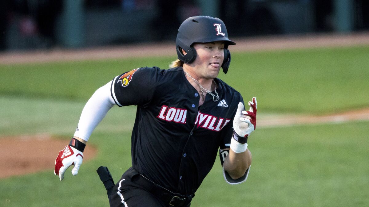 Louisville's Lucas Dunn (7) runs to first base during an NCAA baseball game