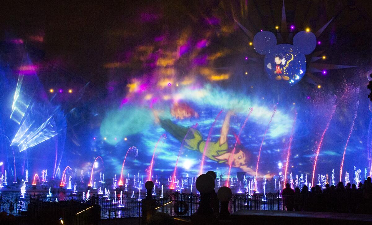 An image of Disney's Peter Pan is projected on spraying water at Disney California Adventure in 2015. 