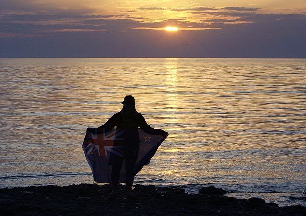 An Australian stands at Anzac Cove in Gallipoli, Turkey, the day before ANZAC Day commemorations marking the 95th anniversary of the World War I landing by the Australian and New Zealand Army Corps.