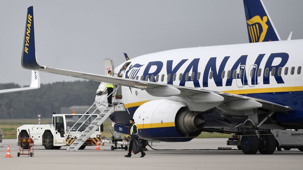 A video showing a white man directing racial slurs at a black woman sitting close to him on a Ryanair flight went viral in October. The man later apologized.