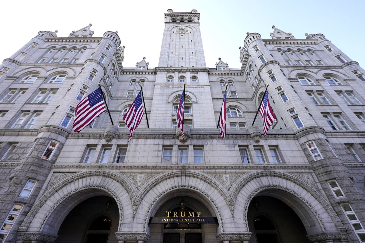 FILE - A view of The Trump International Hotel is seen, March 4, 2021, in Washington. Former President Donald Trump’s businesses and inaugural committee have reached a deal to pay Washington, D.C., $750,000 to resolve a lawsuit that alleged the committee overpaid for events at the Trump International Hotel and enriched the former president’s family in the process. That's according to the District of Columbia’s attorney general. (AP Photo/Julio Cortez, file)