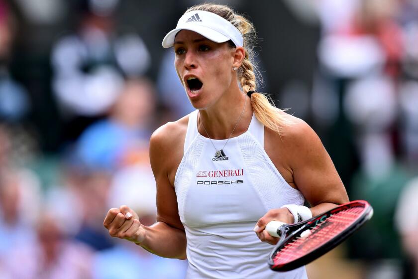 Germany's Angelique Kerber celebrates after winning a point against US player Irina Falconi during their women's singles first round match on the first day of the 2017 Wimbledon Championships at The All England Lawn Tennis Club in Wimbledon, southwest London, on July 3, 2017. / AFP PHOTO / Glyn KIRK / RESTRICTED TO EDITORIAL USEGLYN KIRK/AFP/Getty Images ** OUTS - ELSENT, FPG, CM - OUTS * NM, PH, VA if sourced by CT, LA or MoD **