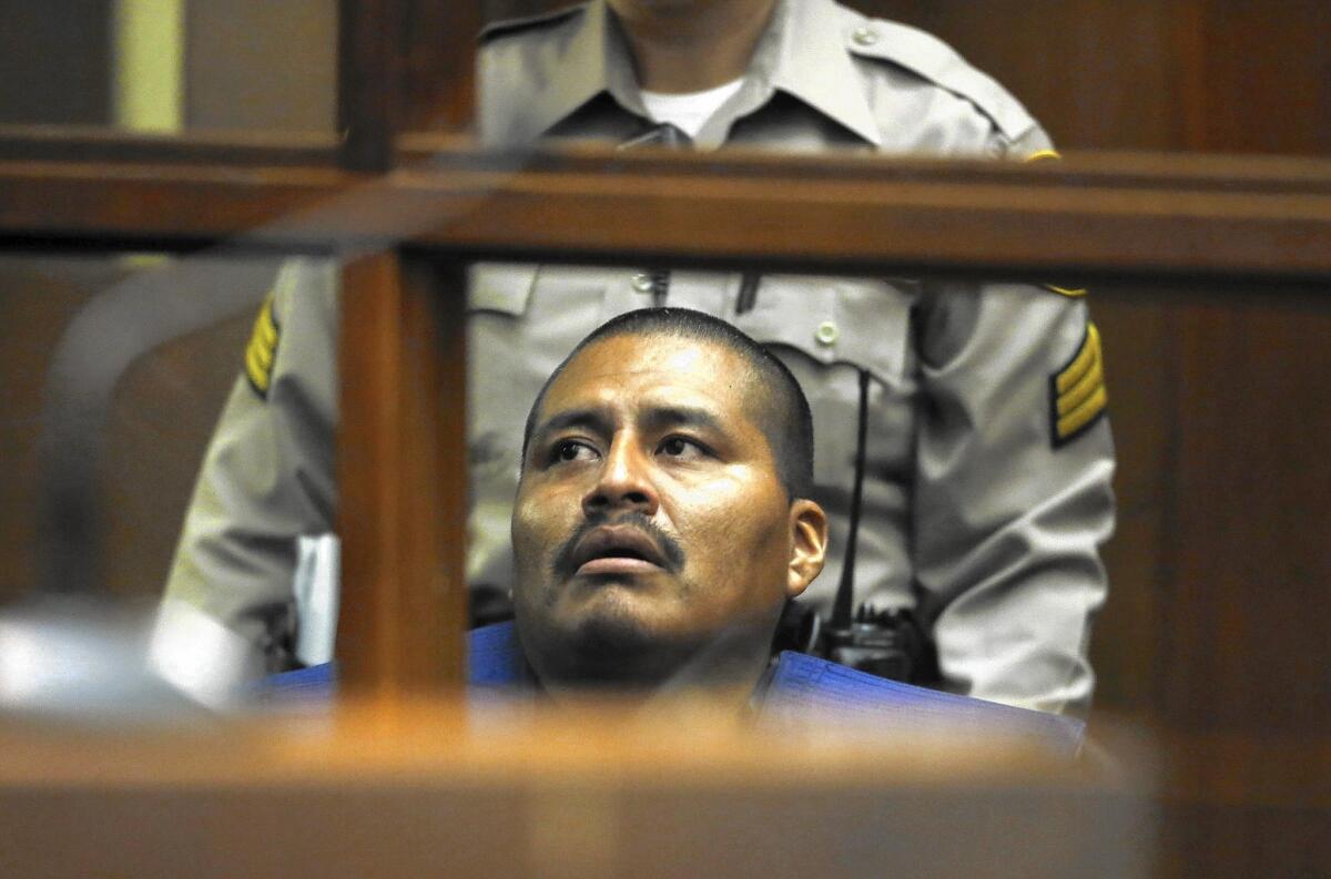 Luiz Fuentes, who is accused of killing his three sons in a car in South Los Angeles, appears in court Sept. 16. He's on suicide watch in L.A. County Jail.