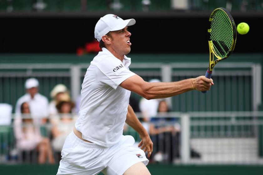 LONDON, ENGLAND - JULY 08: Sam Querrey of The United States plays a forehand in his Men's Singles fourth round match against Tennys Sandgren of The United States during Day Seven of The Championships - Wimbledon 2019 at All England Lawn Tennis and Croquet Club on July 08, 2019 in London, England. (Photo by Matthias Hangst/Getty Images) ** OUTS - ELSENT, FPG, CM - OUTS * NM, PH, VA if sourced by CT, LA or MoD **