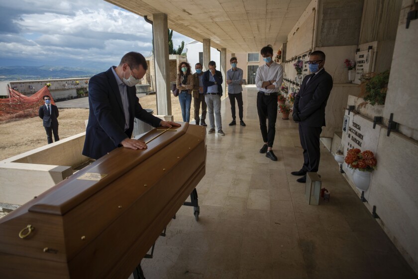 Virus Outbreak Italy Funerals Photo Gallery