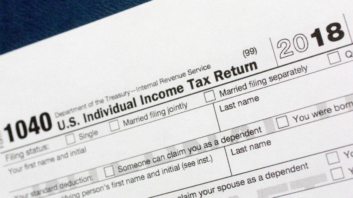 A portion of the 1040 income tax return form for 2018.