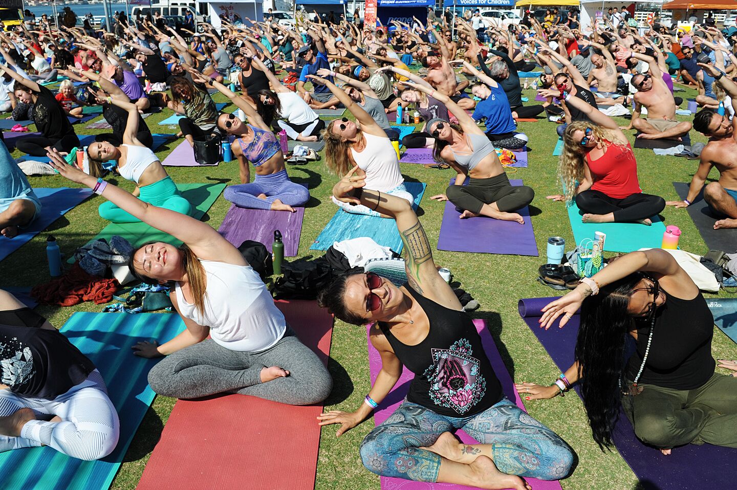 Yogis got their downward dog on at the One Love Movement's 8th Annual Charity Yoga & Live Music Event at Waterfront Park on Saturday, Sept. 21, 2019.