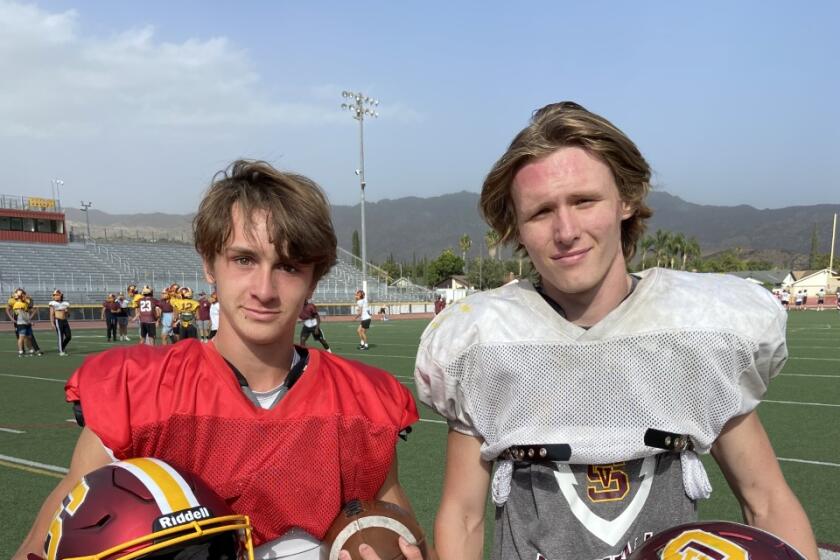 Simi Valley quarterback Steele Pizzella (left) and senior linebacker Will Bush.
