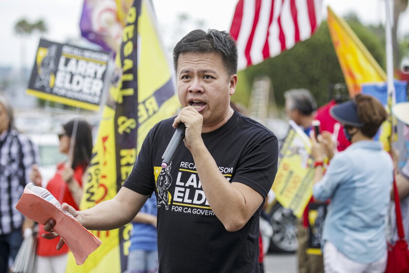 Larry Elder supporter Marc Ang addresses a recall election rally in Rowland Heights.