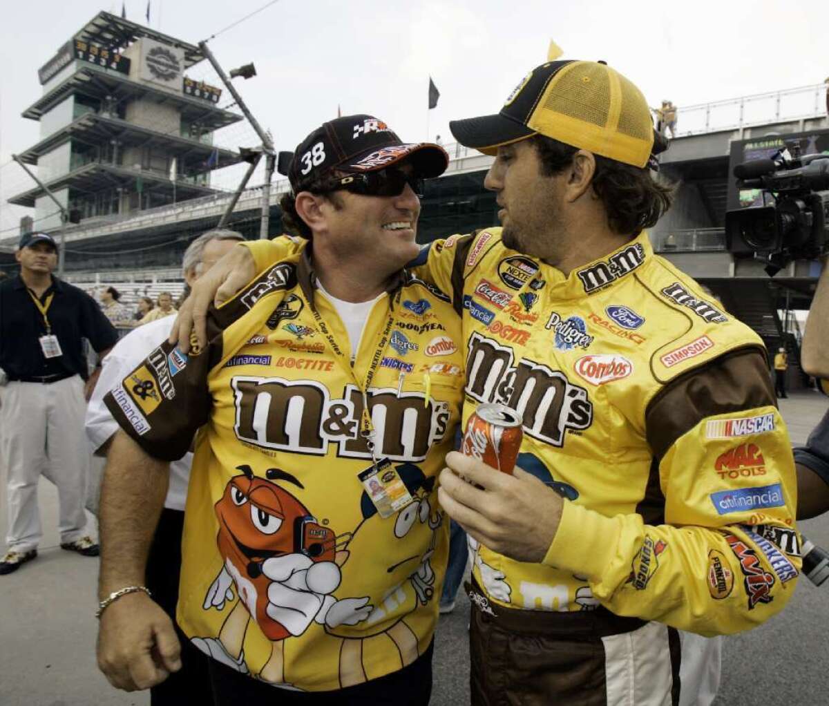 NASCAR driver Elliott Sadler, right, hugs crew chief Todd Parrott in 2005.
