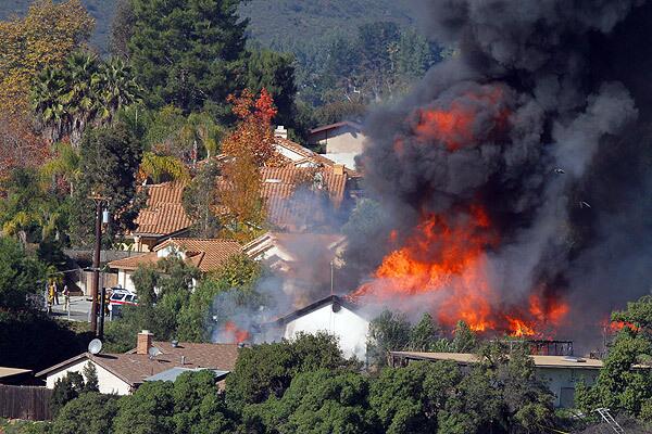 A house once occupied by bomb maker George Jakubec goes up in flames during a controlled burn near Escondido. After weeks of planning, the blaze went off as planned, incinerating dangerous chemicals and reducing the structure to ashes.