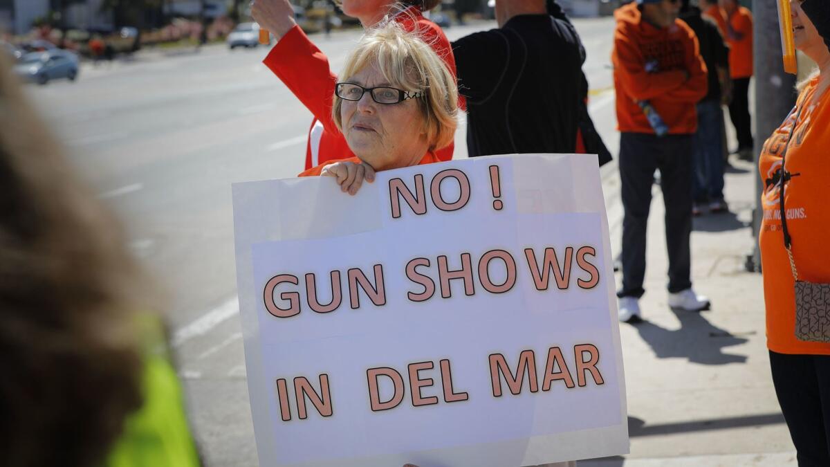 Sherryl Parks was one of about 80 people from NeverAgainCa who protested outside the Del Mar Fairgrounds against the Crossroads of the West Gun Show Saturday.