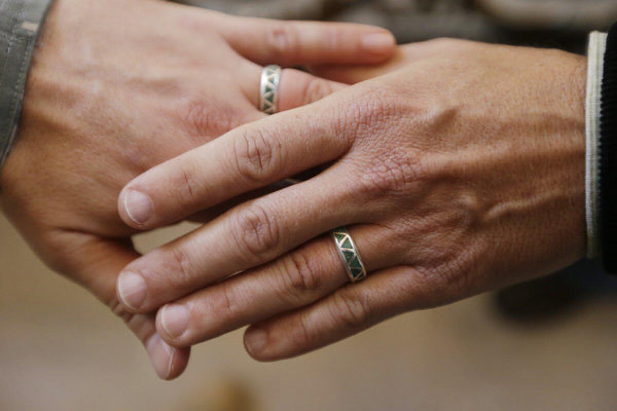 A gay couple show off their wedding rings after tying the knot in San Francisco. On Friday, the State Department said that those in same-sex marriages will be given the same preferential consideration in their visa applications now enjoyed by those in opposite-sex marriages.