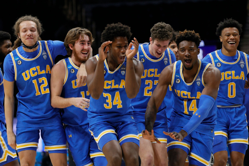 Members of the UCLA men's basketball team celebrate