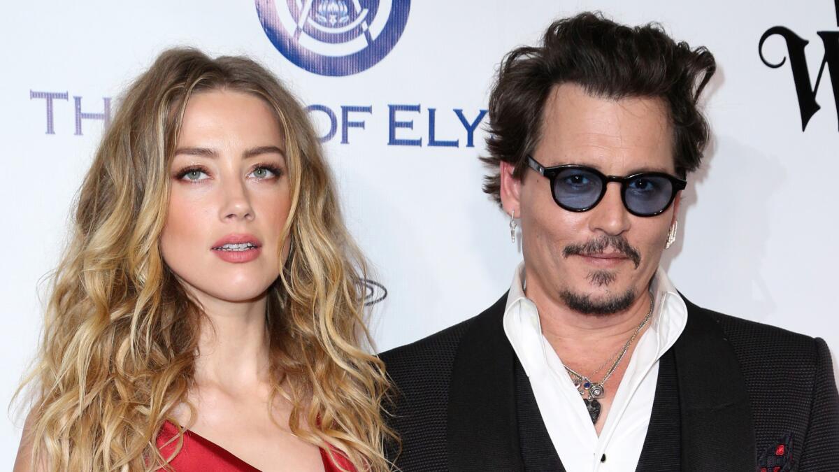 Amber Heard and Johnny Depp are seen together in January 2016.