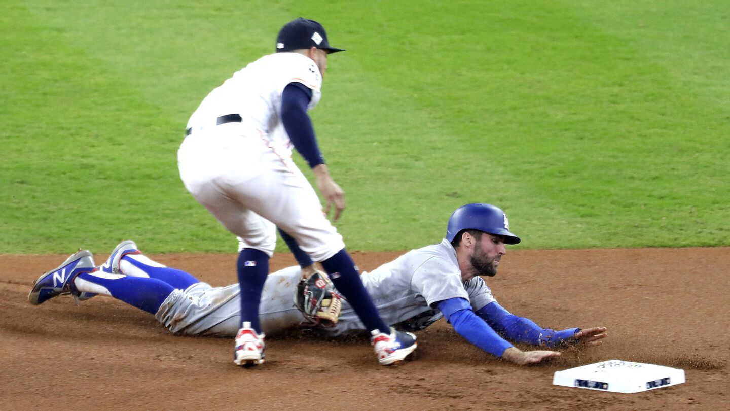 Chris Taylor of the Dodgers is caught stealing to end the top of the first inning.