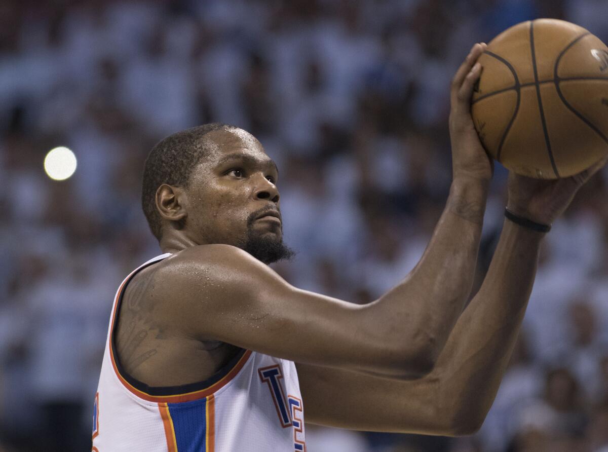 Thunder forward Kevin Durant shoots a free throw against the Spurs during the second half of Game 4.